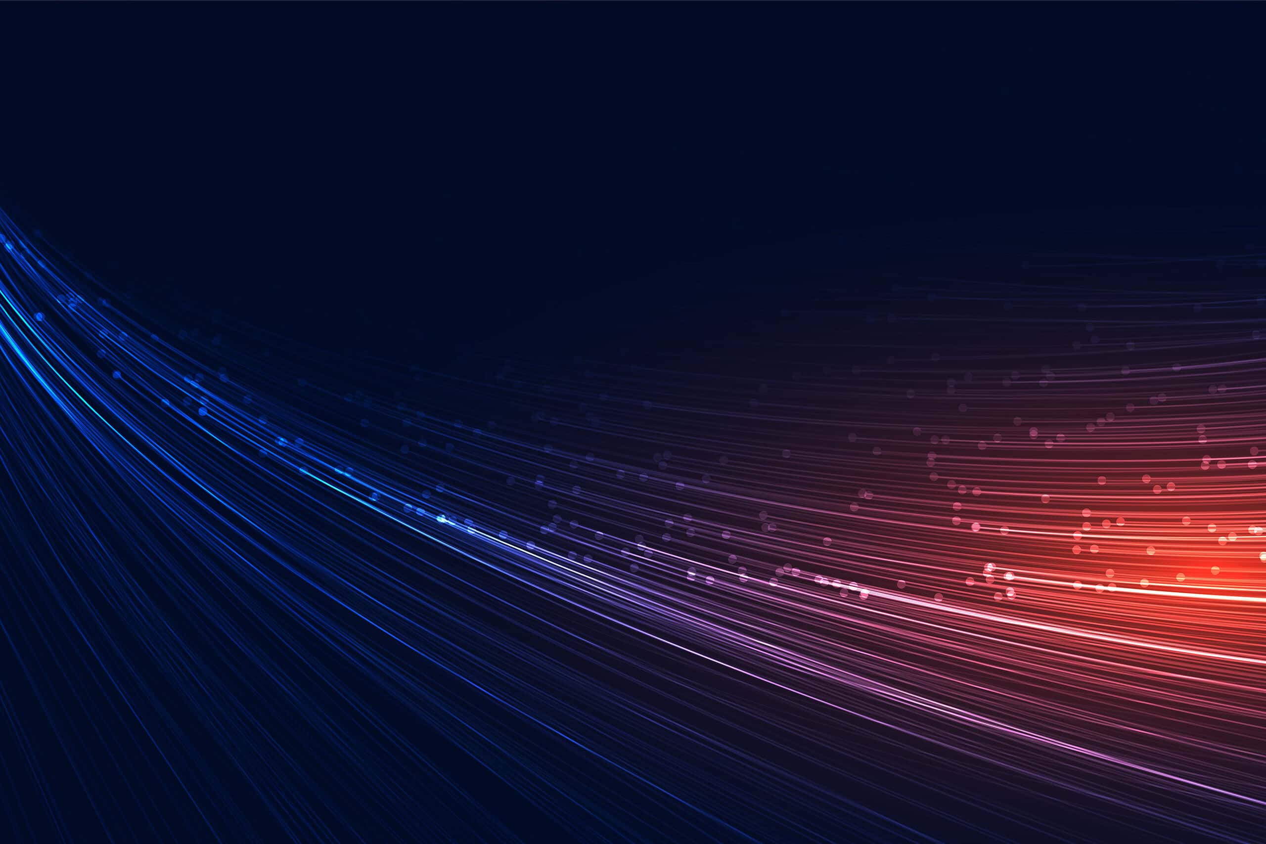 High-tech digital data streams with vibrant blue and red light trails representing advanced analytics and business intelligence solutions.